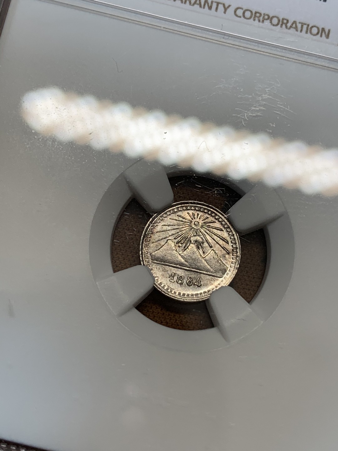 《竞宝斋》第67场-本周日，周一，周四.3场连拍（全场不限金额包邮） NGC-MS64危地马拉1884年1/4R小银币