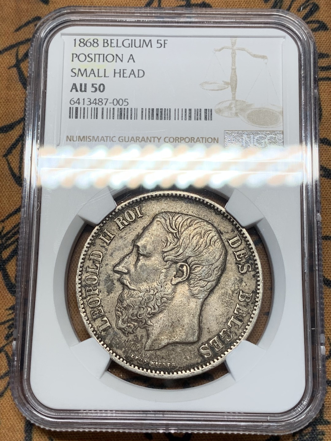 《竞宝斋》第67场-本周日，周一，周四.3场连拍（全场不限金额包邮） NGC AU50 比利时 1868年利奥波德二世五法郎银币 老包浆好品相