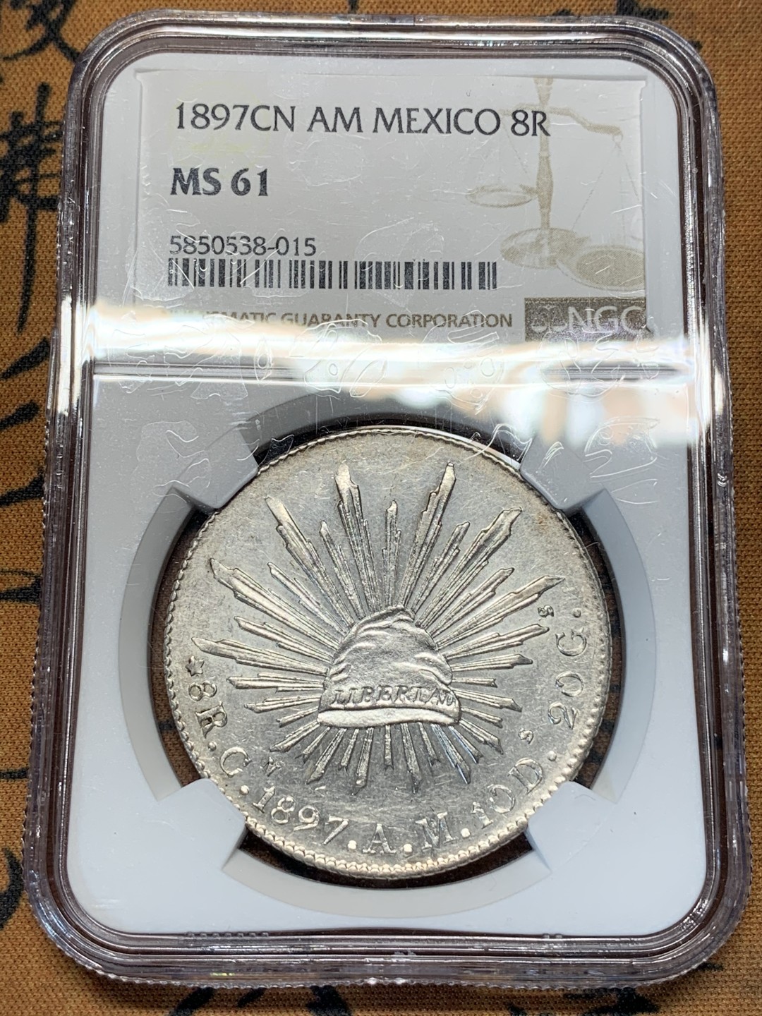 《竞宝斋》第67场-本周日，周一，周四.3场连拍（全场不限金额包邮） NGC MS61 墨西哥 1897年 8R 花边鹰洋 底板深打 状态好，羽毛光亮 一根不少