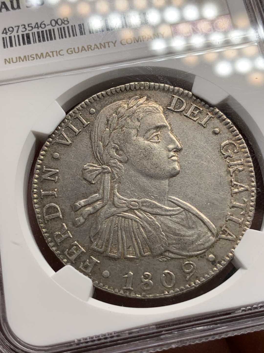 《竞宝斋》第67场-本周日，周一，周四.3场连拍（全场不限金额包邮） NGC AU58 西属 墨西哥1809年 费七 8瑞尔 大银币 脸上的婴儿肥还在 正反全深打 很不错