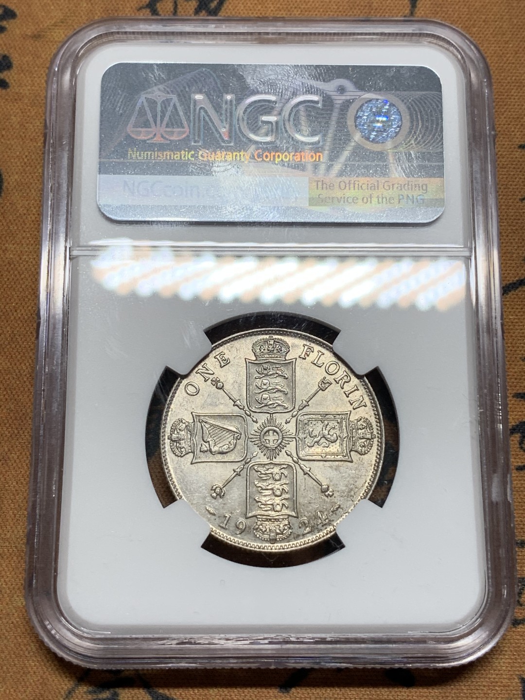 《竞宝斋》第67场-本周日，周一，周四.3场连拍（全场不限金额包邮） NGC-AU58 英国1924年 乔五 2先令 银币 好品像， 买的时候看62的状态买的