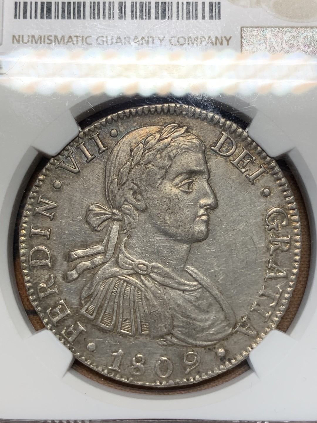 《竞宝斋》第67场-本周日，周一，周四.3场连拍（全场不限金额包邮） NGC AU58 西属 墨西哥1809年 费七 8瑞尔 大银币 脸上的婴儿肥还在 正反全深打 很不错