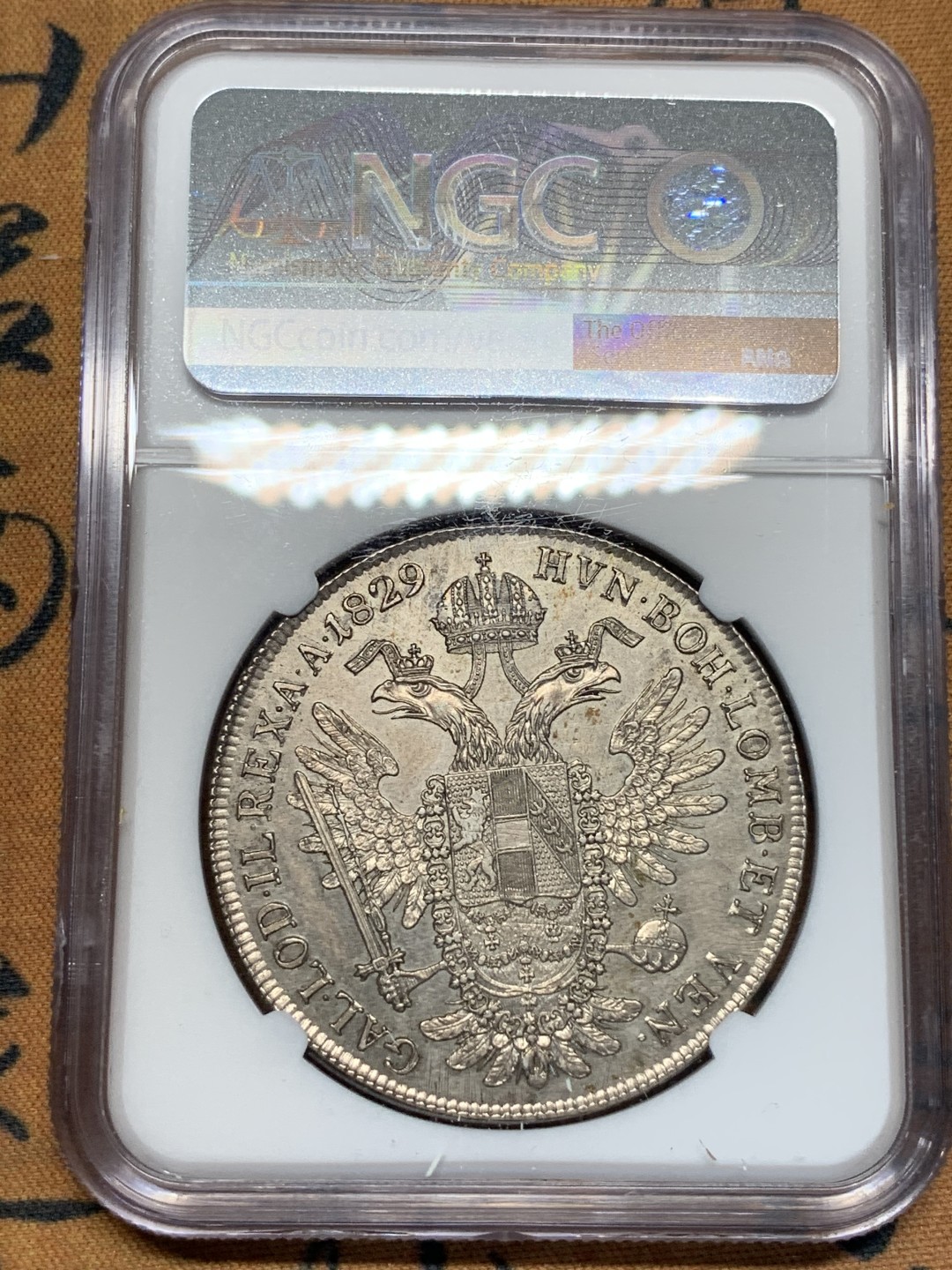 《竞宝斋》第67场-本周日，周一，周四.3场连拍（全场不限金额包邮） NGC AU 奥地利 1829年弗朗茨一世泰勒大银币 好品相