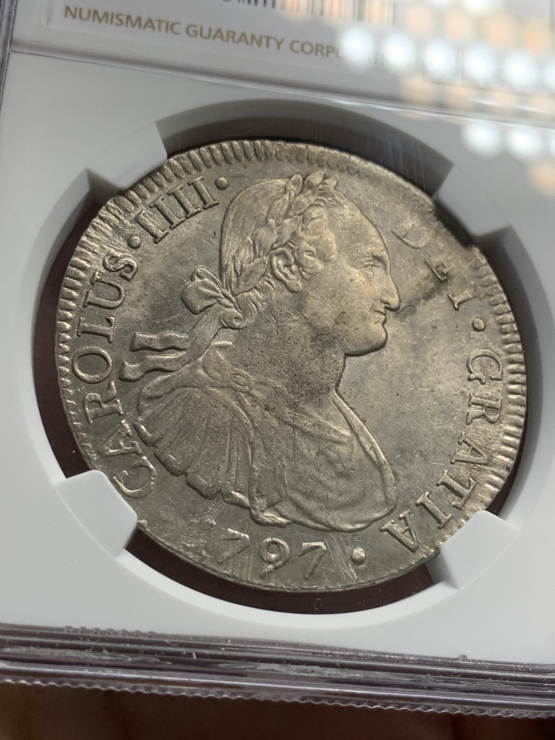 《竞宝斋》第67场-本周日，周一，周四.3场连拍（全场不限金额包邮） NGC UNC细节评级 墨西哥 1797年 卡四双柱 8R银币 打制的很不错 细节见图