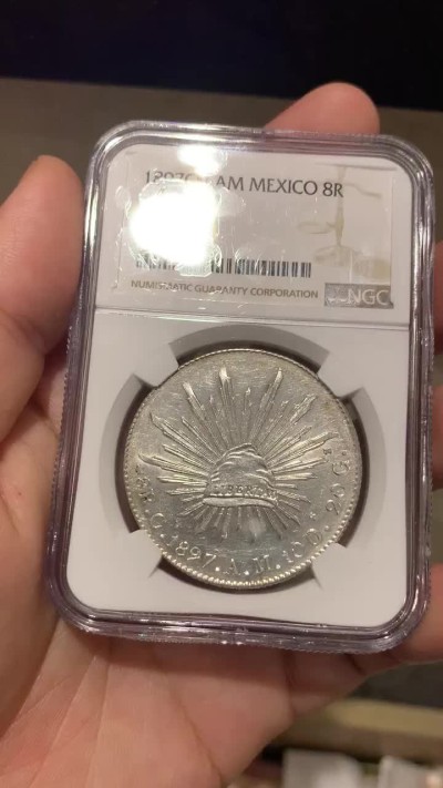 《竞宝斋》第67场-本周日，周一，周四.3场连拍（全场不限金额包邮） NGC MS61 墨西哥 1897年 8R 花边鹰洋 底板深打 状态好，羽毛光亮 一根不少