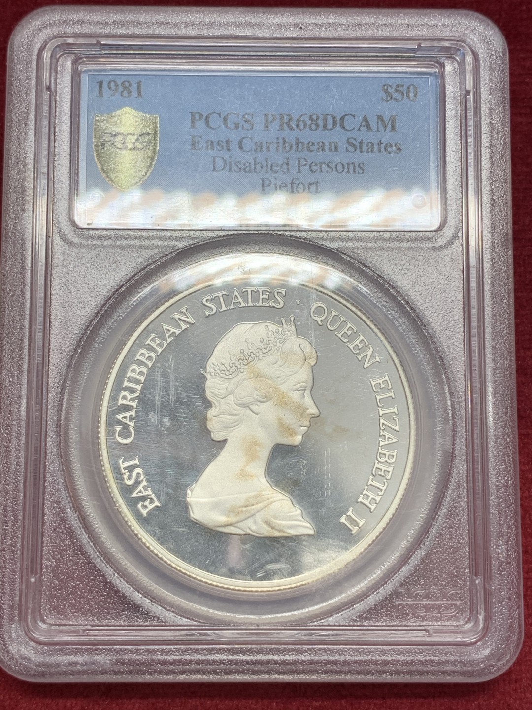 《竞宝斋》第68场-本周日，周一，周四.3场连拍（全场不限金额包邮） PCGS PR68DCAM  东加勒比 1981年 残疾人 Piefort加厚 50元银币 发行量1000枚