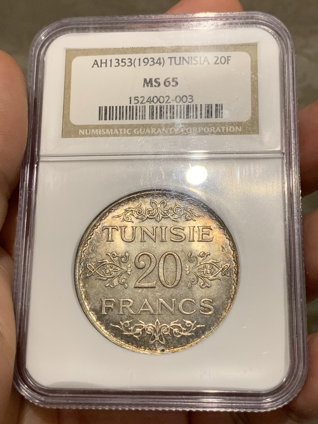 《竞宝斋》第68场-本周日，周一，周四.3场连拍（全场不限金额包邮） NGC MS65 AH1353年法属突尼斯20法郎银币 高分，双面带彩，挺好看的一枚币