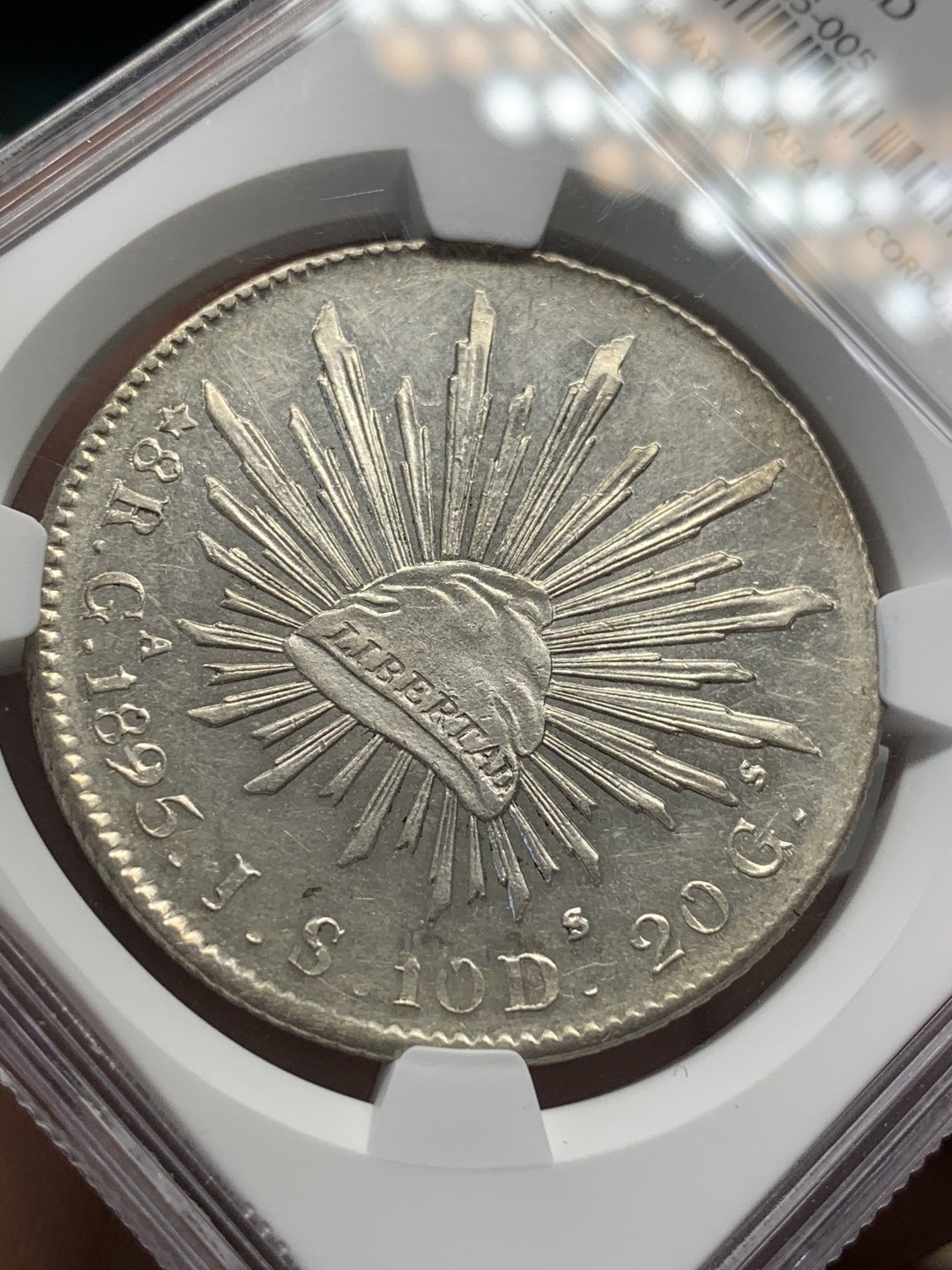 《竞宝斋》第68场-本周日，周一，周四.3场连拍（全场不限金额包邮） NGC-UNC墨西哥1895年8瑞尔鹰洋，打制清晰，光泽一流，鹰毫毕现，类精制