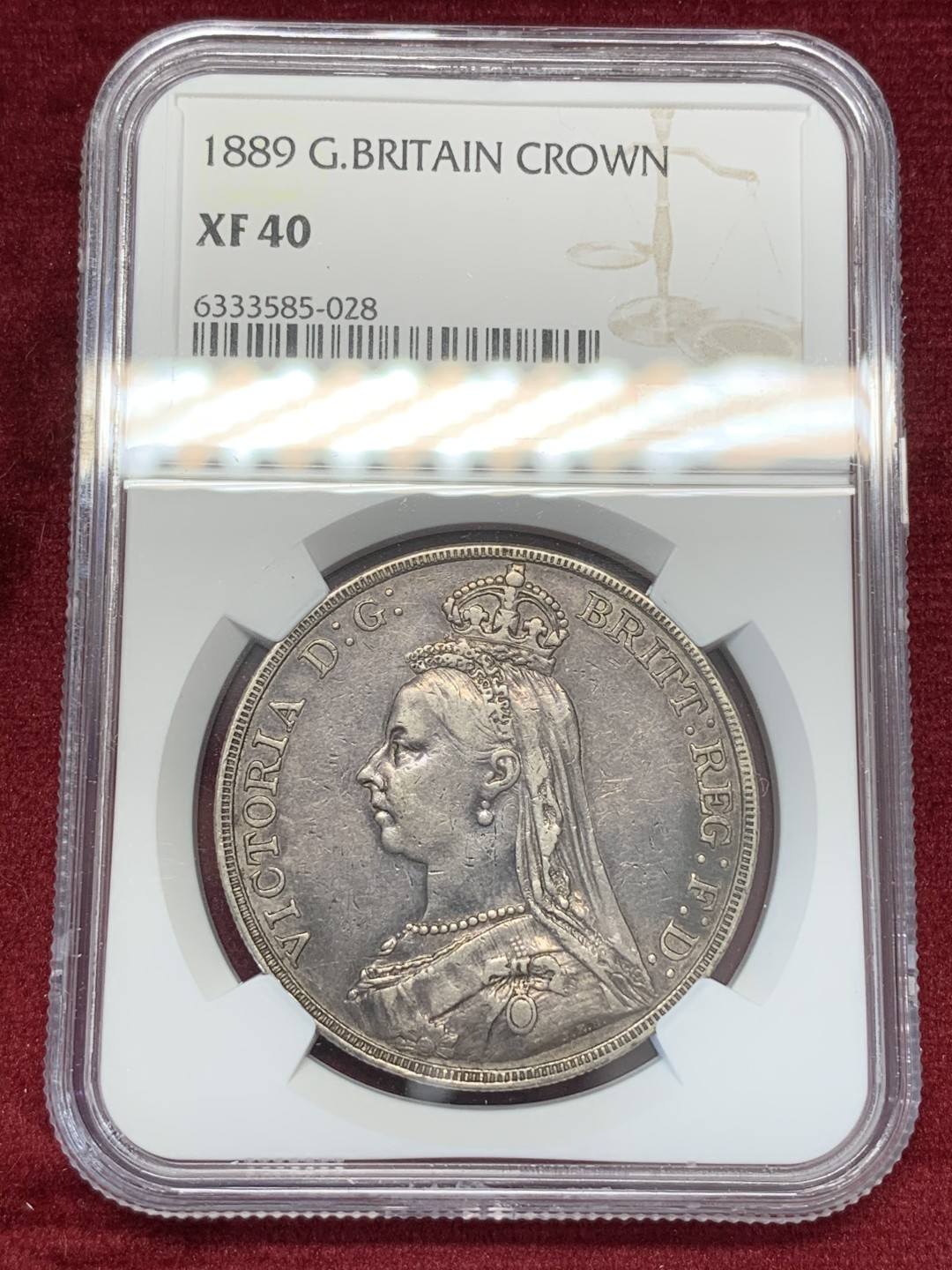 《竞宝斋》第68场-本周日，周一，周四.3场连拍（全场不限金额包邮） NGC-XF40,英国维多利亚高冠马剑1克朗，自然黑彩，1889年。