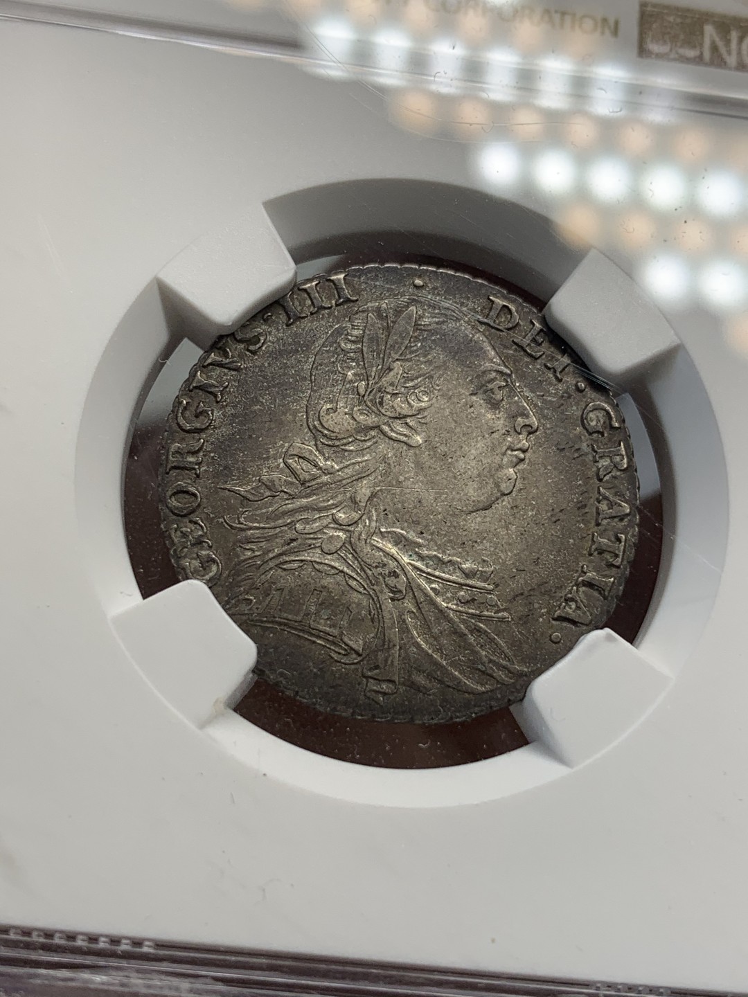 《竞宝斋》第69场-本周日，周一，周四.3场连拍（全场不限金额包邮） NGC AU53 英国 1787年 乔治三世 1先令 银币 原味深包浆 打制的非常好