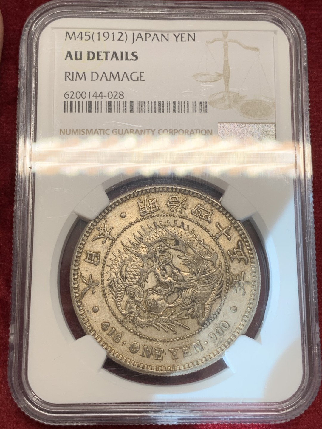 《竞宝斋》第69场-本周日，周一，周四.3场连拍（全场不限金额包邮） NGC AU 日本 明治四十五年 日龙 壹元 银币 包浆不错也是不多见的年份