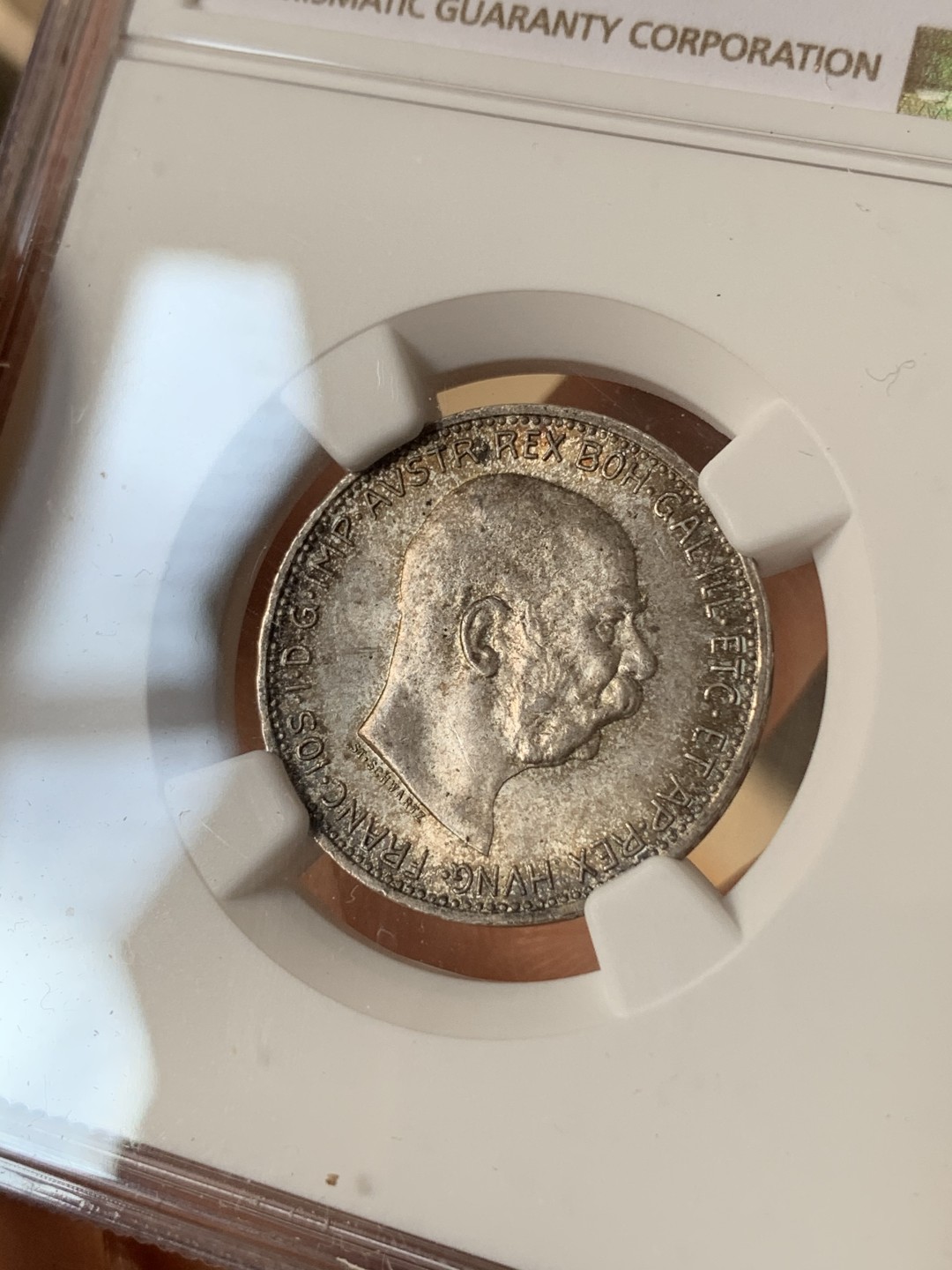 《竞宝斋》第69场-本周日，周一，周四.3场连拍（全场不限金额包邮） NGC-MS64 奥地利 1915年佛朗茨约瑟夫 1克朗 银币 五彩包浆 