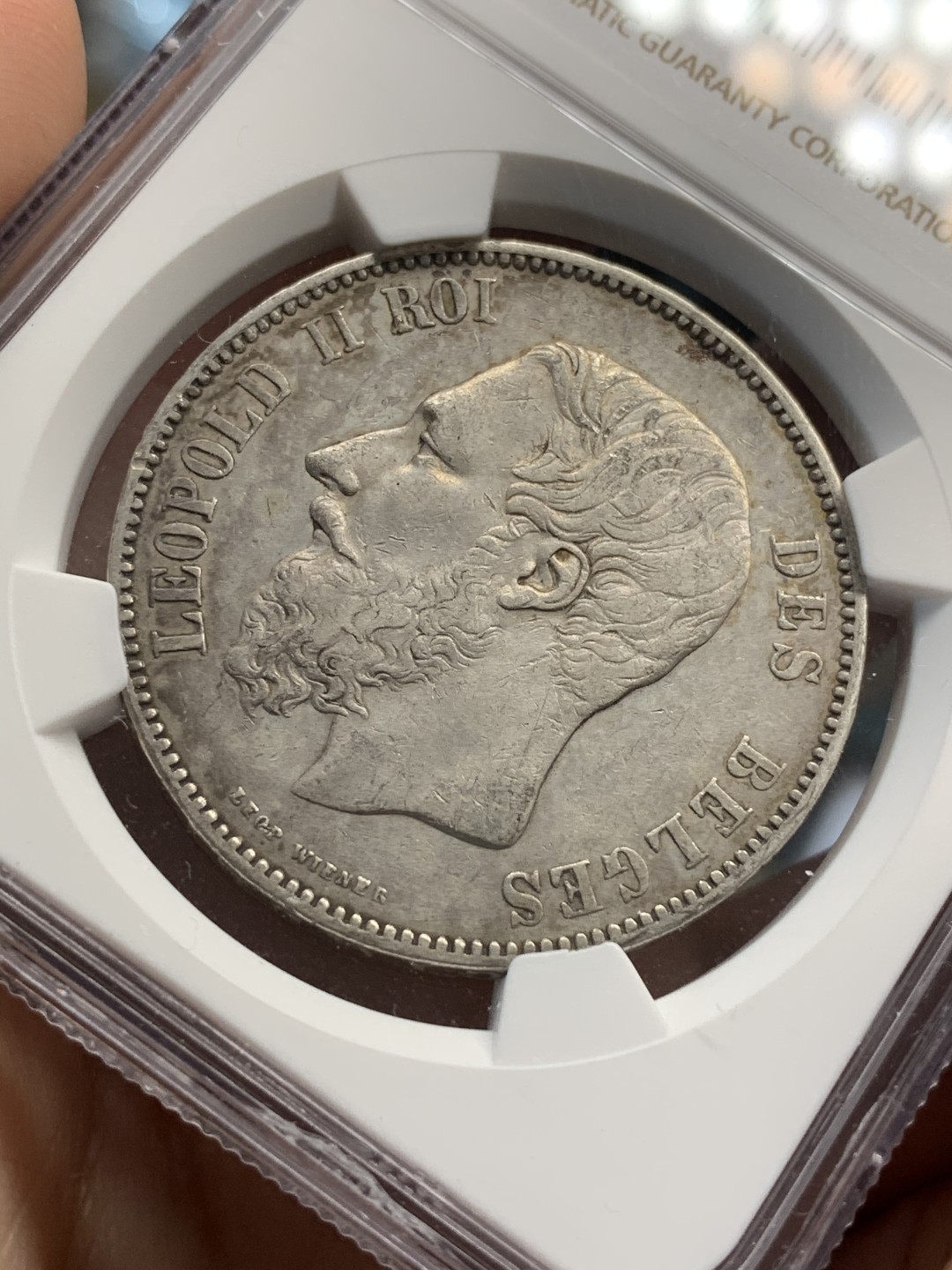 《竞宝斋》第69场-本周日，周一，周四.3场连拍（全场不限金额包邮） NGC AU细节评级 比利时 1873年利奥波德二世五法郎银币 带底光好品相