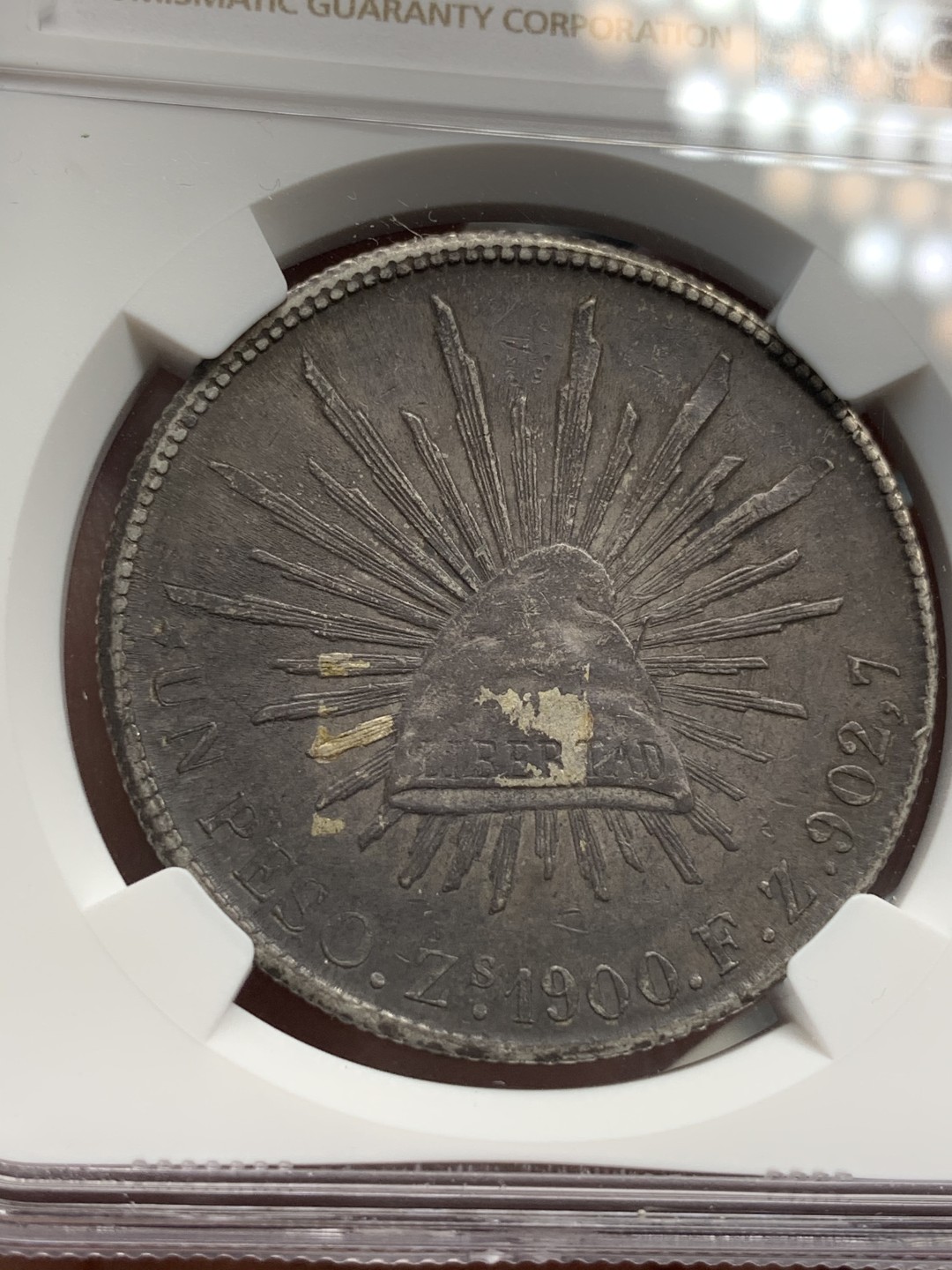 《竞宝斋》第69场-本周日，周一，周四.3场连拍（全场不限金额包邮） NGC AU50 墨西哥 1900年 墨西哥 直边 鹰洋 银币 双面炭黑包浆 状态好