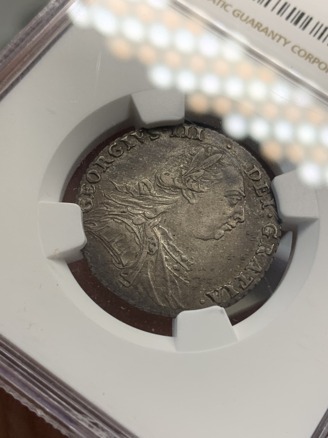 《竞宝斋》第69场-本周日，周一，周四.3场连拍（全场不限金额包邮） NGC AU53 英国 1787年 乔治三世 1先令 银币 原味深包浆 打制的非常好