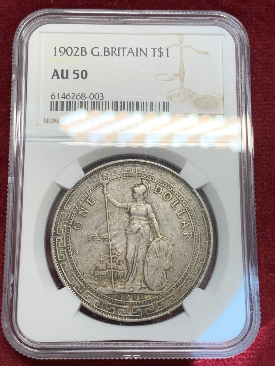 《竞宝斋》第69场-本周日，周一，周四.3场连拍（全场不限金额包邮） NGC AU50  英国贸易银 1902年 壹元 站人 银元 淡金包浆 双面原味好状态