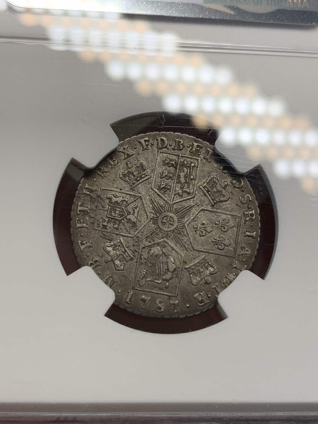 《竞宝斋》第69场-本周日，周一，周四.3场连拍（全场不限金额包邮） NGC AU53 英国 1787年 乔治三世 1先令 银币 原味深包浆 打制的非常好