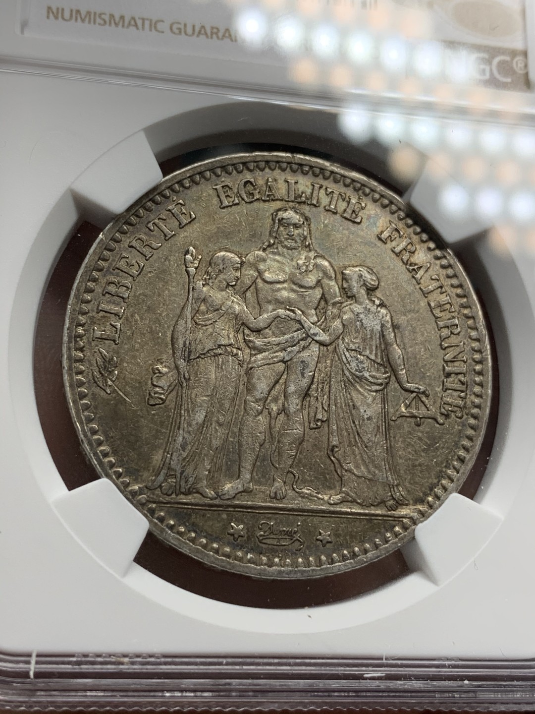 《竞宝斋》第69场-本周日，周一，周四.3场连拍（全场不限金额包邮） NGC AU55 法国 1875年小A版 大力神5法郎银币 双面深包浆 缺点光 细节非常好 也是不多见的年份