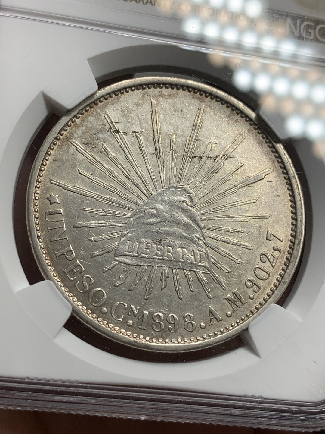 《竞宝斋》西.葡及其殖民地国家专场-第70场（全场不限金额包邮） NGC AUD 墨西哥 1898年CN AM版 直边 鹰洋银币淡彩包浆 细节优秀