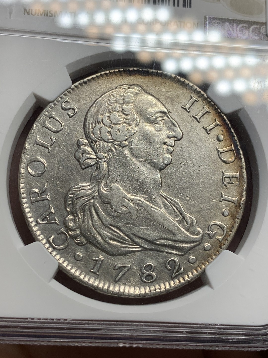 《竞宝斋》西.葡及其殖民地国家专场-第70场（全场不限金额包邮） NGC 西班牙本土 1782年 卡洛斯三世 马德里厂8R银币，特年 环彩包浆 人物形象