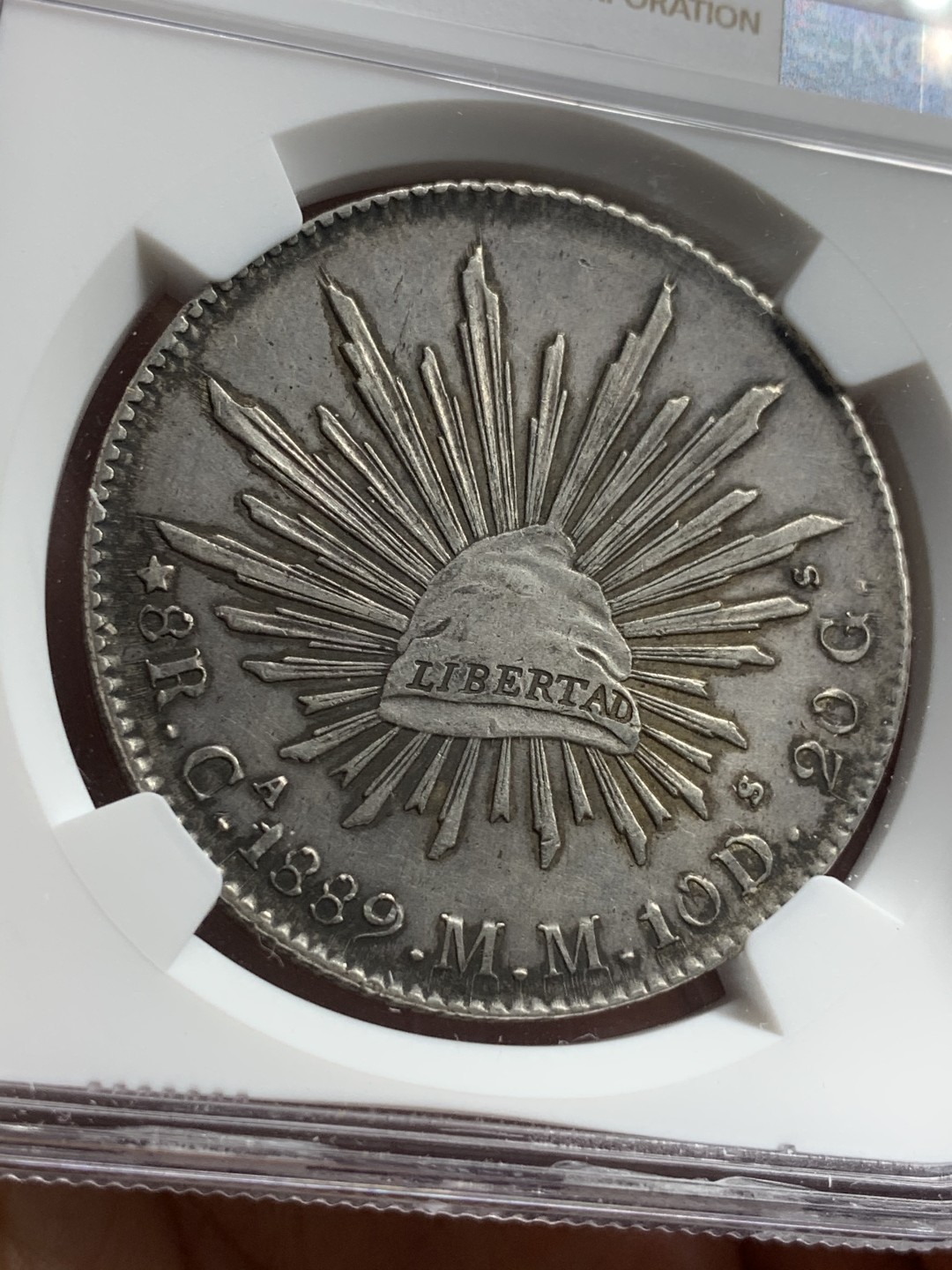 《竞宝斋》西.葡及其殖民地国家专场-第70场（全场不限金额包邮） NGC-AUD 墨西哥 1889年CA MM版 花边鹰洋 8里亚尔银币 原味黑包浆 带点彩 个人非常喜欢  