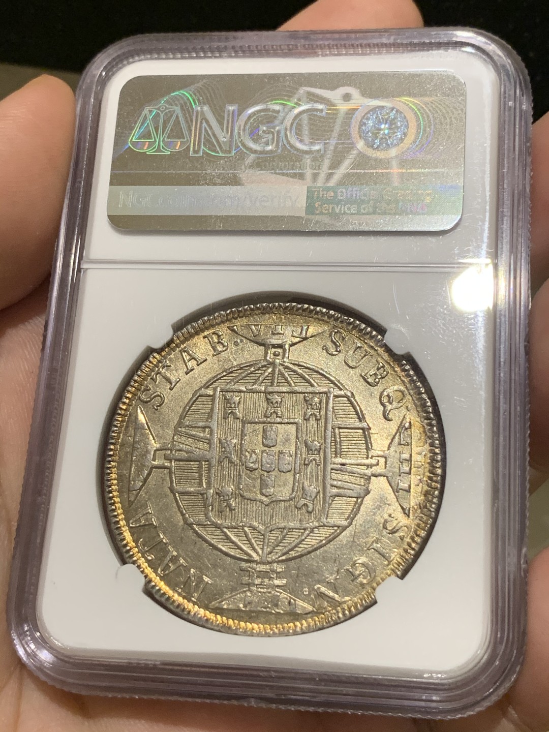 《竞宝斋》西.葡及其殖民地国家专场-第70场（全场不限金额包邮） 名誉品加盖 NGC-MS61 1821年葡属巴西R版960瑞斯 加盖于名誉品1820年智利火山比索上，双面金色包浆 非常难得品相