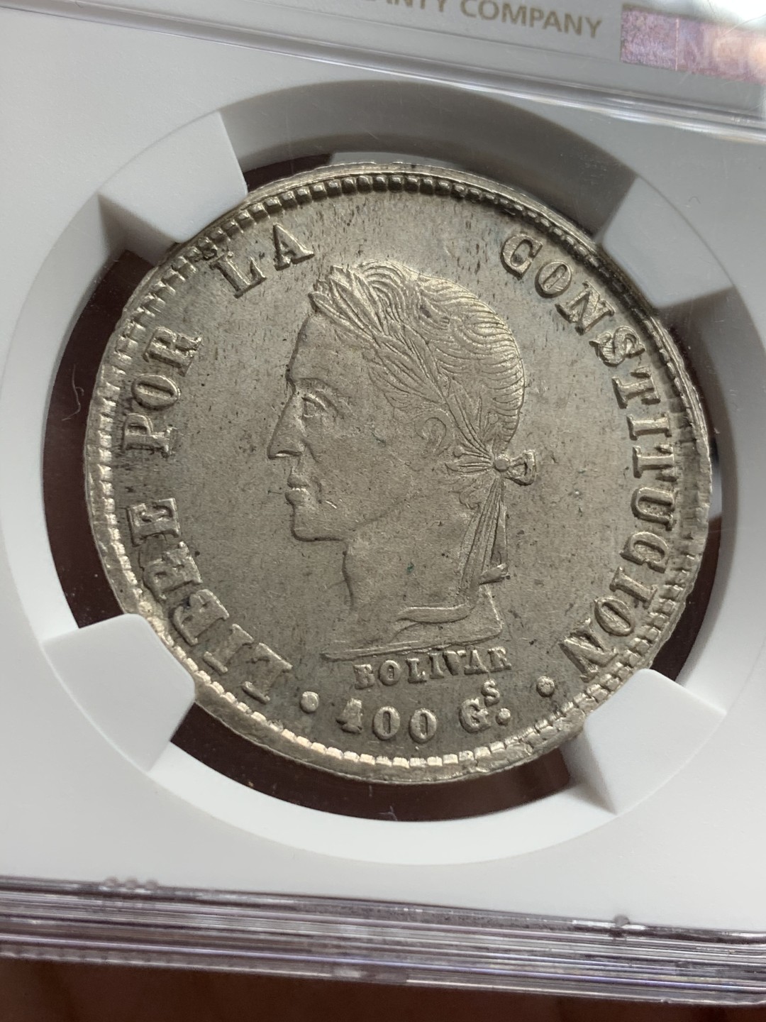 《竞宝斋》西.葡及其殖民地国家专场-第70场（全场不限金额包邮） NGC-AU58  玻利维亚 1860年 8索尔 玻利瓦尔头像银币 原光背面打制的特别好