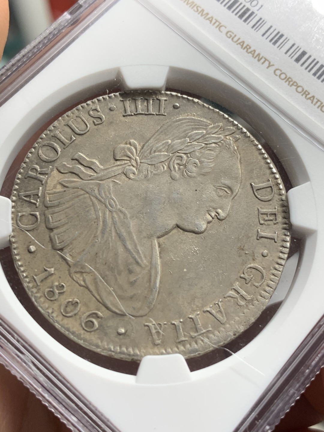 《竞宝斋》西.葡及其殖民地国家专场-第70场（全场不限金额包邮） NGC-UNCD 墨西哥 1806年 卡洛斯四世双柱8R大银币 双面深打好状态背面带点光