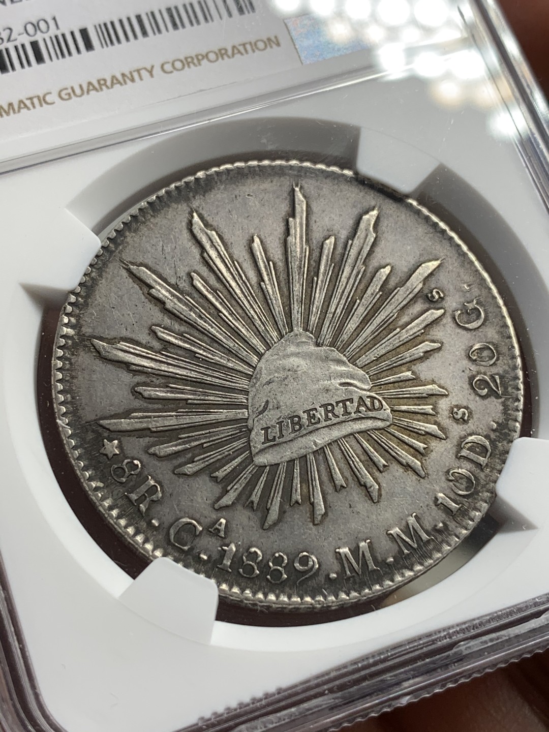 《竞宝斋》西.葡及其殖民地国家专场-第70场（全场不限金额包邮） NGC-AUD 墨西哥 1889年CA MM版 花边鹰洋 8里亚尔银币 原味黑包浆 带点彩 个人非常喜欢  