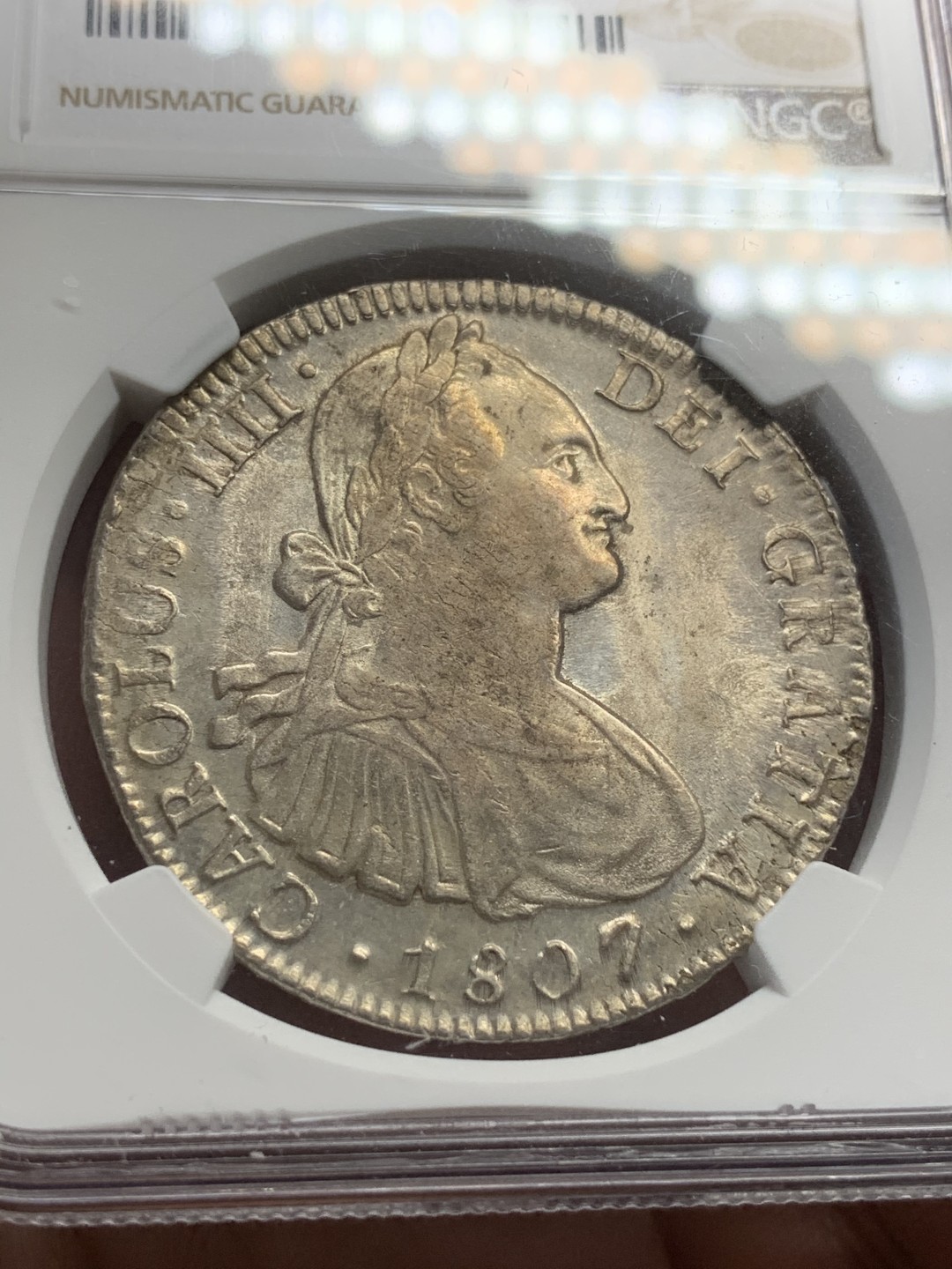 《竞宝斋》西.葡及其殖民地国家专场-第70场（全场不限金额包邮） NGC-MS62 墨西哥双柱 卡四 1807年 8里亚尔 双柱大银币 高等级状态 笑容可掬