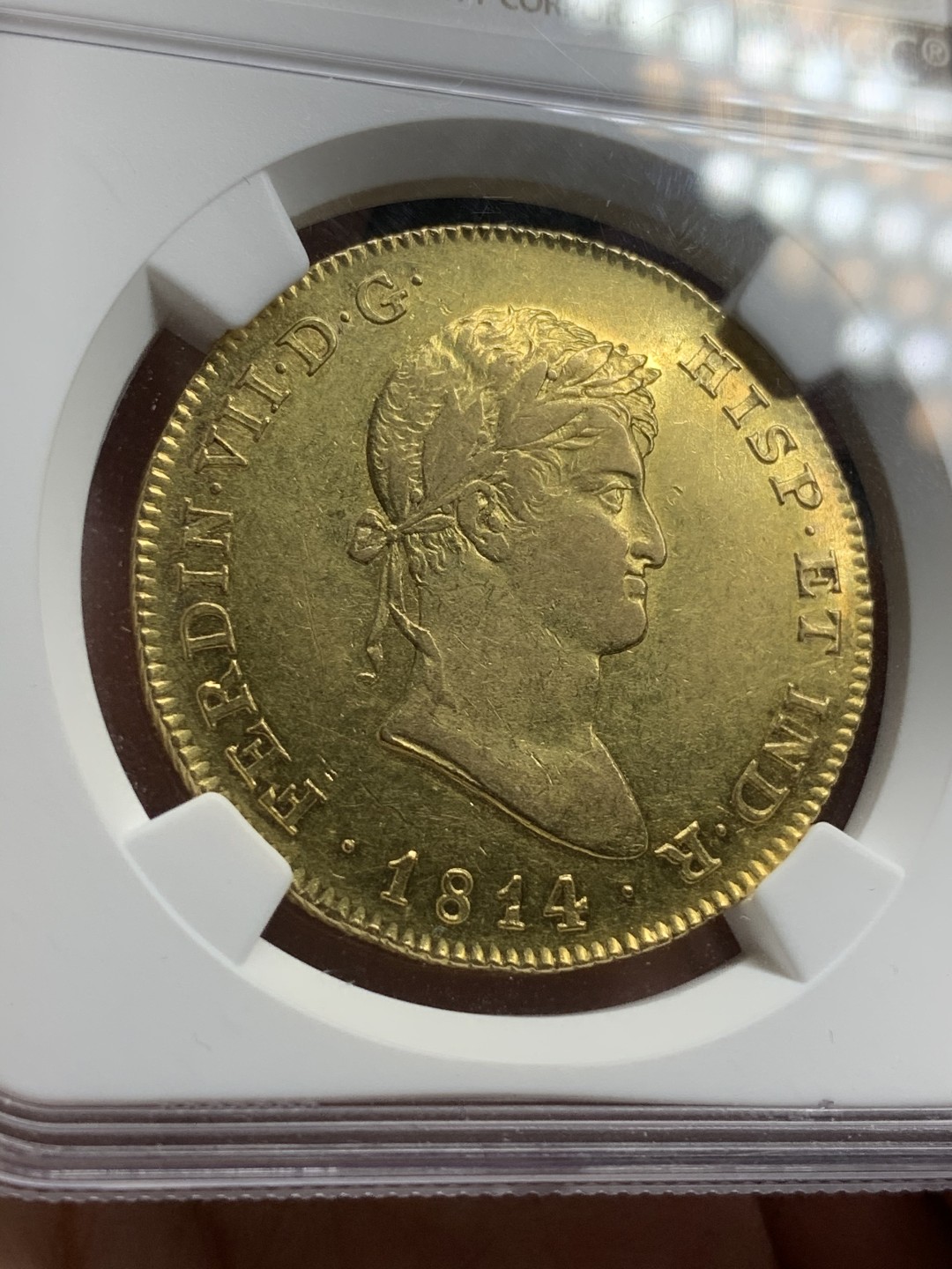 《竞宝斋》西.葡及其殖民地国家专场-第70场（全场不限金额包邮） NGC-AU58 西班牙本土 1814年 费迪南七世 8埃斯库多 大金币 马德里造币厂 罕见 ms状态 背面镜面 克劳斯目录XF40  5000刀 藏家必备