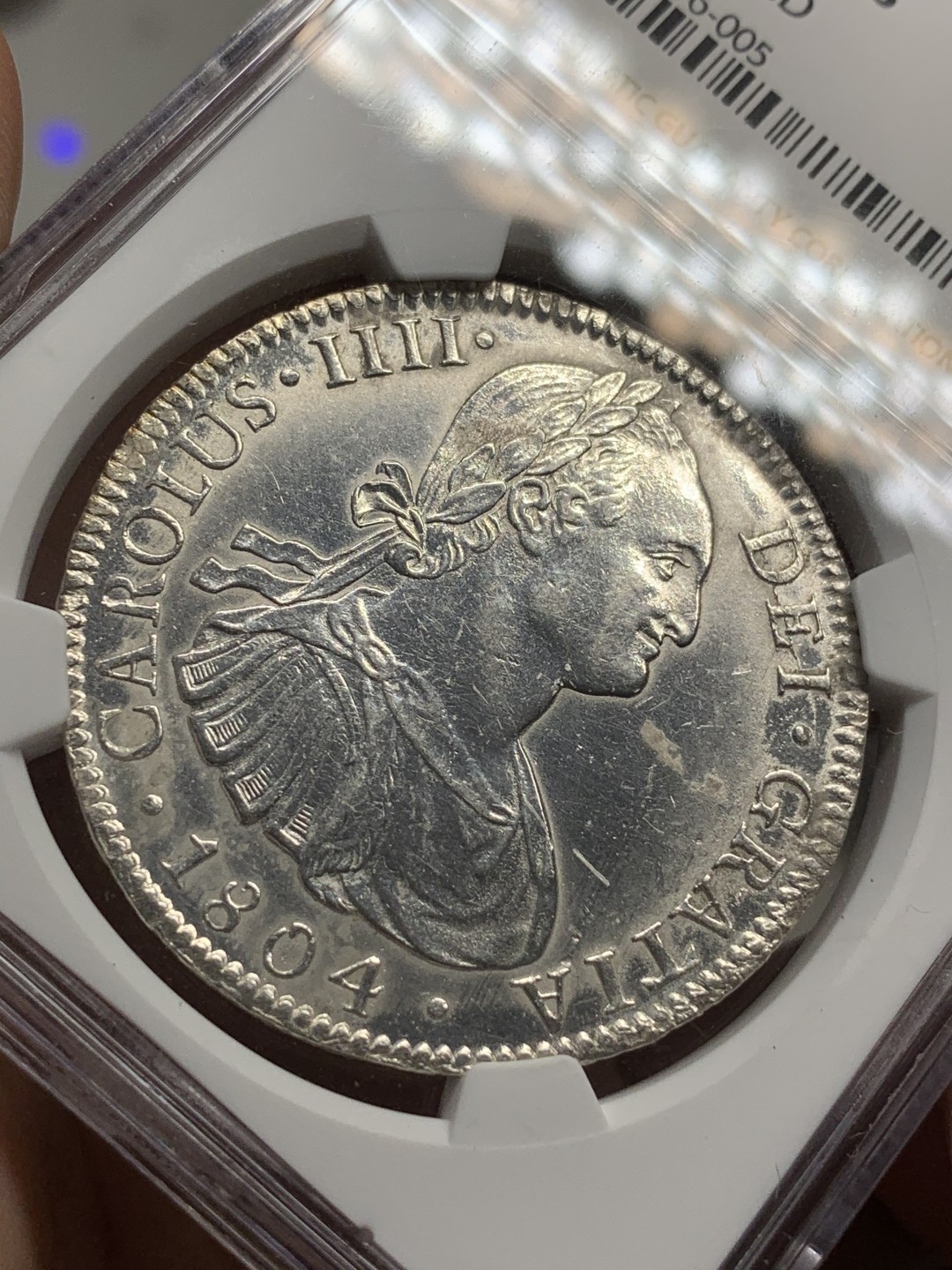 《竞宝斋》西.葡及其殖民地国家专场-第70场（全场不限金额包邮） NGC-AUD 墨西哥双柱 卡洛斯四世 1804年 8里亚尔双柱银币 严重深打 PL的底板