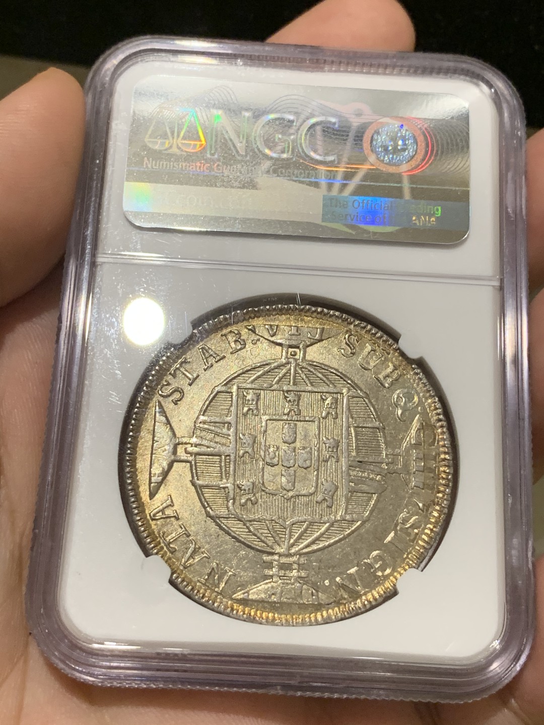 《竞宝斋》西.葡及其殖民地国家专场-第70场（全场不限金额包邮） 名誉品加盖 NGC-MS61 1821年葡属巴西R版960瑞斯 加盖于名誉品1820年智利火山比索上，双面金色包浆 非常难得品相