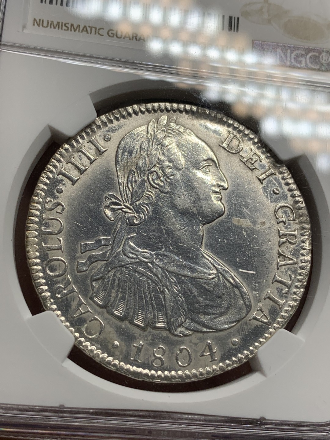 《竞宝斋》西.葡及其殖民地国家专场-第70场（全场不限金额包邮） NGC-AUD 墨西哥双柱 卡洛斯四世 1804年 8里亚尔双柱银币 严重深打 PL的底板