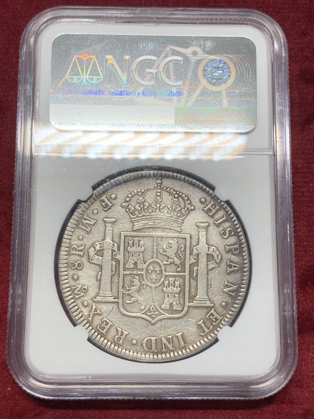 《竞宝斋》西.葡及其殖民地国家专场-第70场（全场不限金额包邮） NGC XF细节评级 墨西哥 卡三 1772年 8里亚尔 双柱银币，少见的首年份 倒FM版 头像、字口、背面的徽盾打的都很清楚。外拍在加个稳步提升，XFD的成交价在400-500刀左右