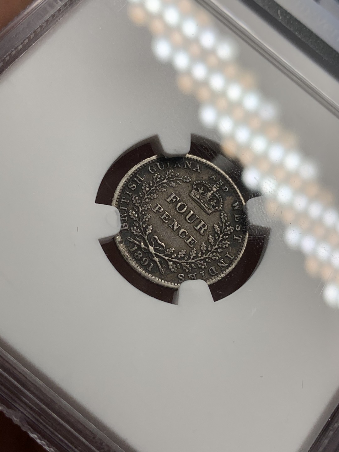 《竞宝斋》第71场-本周日，周一2场连拍（全场不限金额包邮） NGC AU50 1891年英属圭亚那和西印度4便士小银币，包浆完美黑美人发财包浆，英系里这样的包浆不多见。