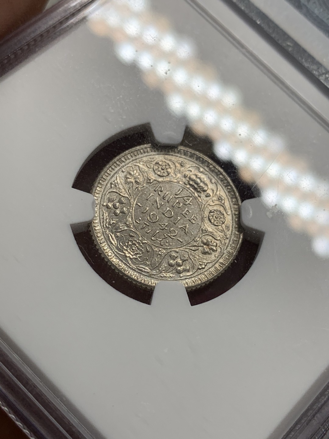 《竞宝斋》第71场-本周日，周一2场连拍（全场不限金额包邮） NGC-MS63 英属印度 1942年（C） 乔六印度1/4卢比银币 打制清晰，淡彩包浆,味道不错