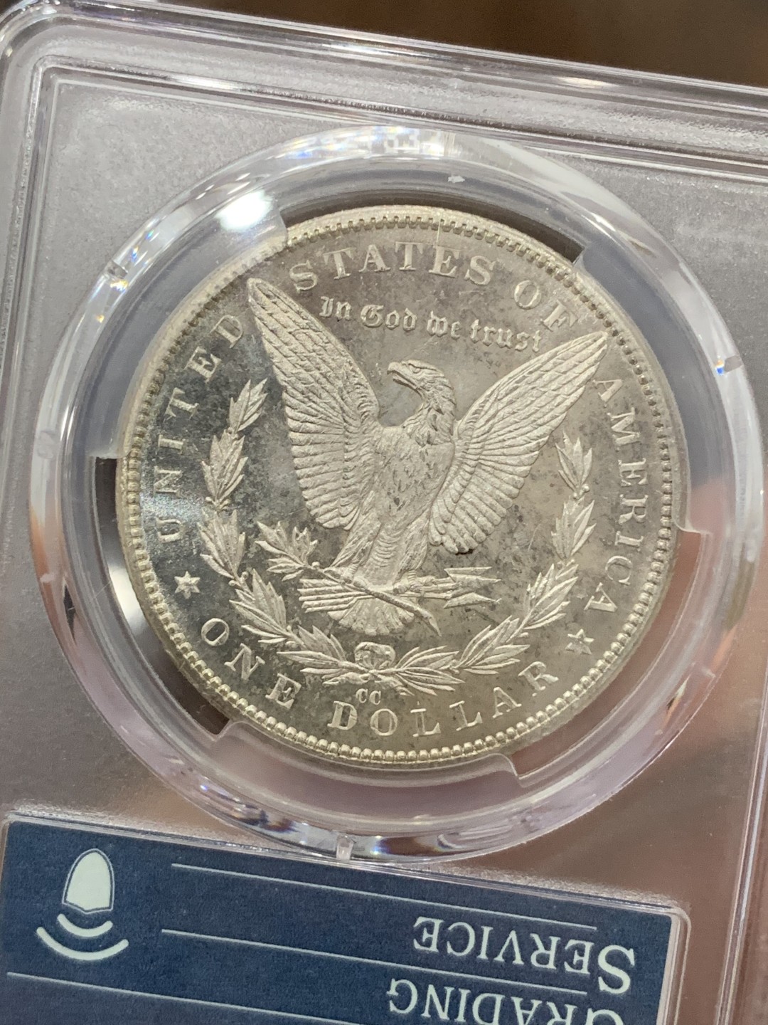 《竞宝斋》第71场-本周日，周一2场连拍（全场不限金额包邮） PCGS-MS64PL 美国 1882年 一美元 摩根币 卡森厂+类精致+35周年限定标 一步到位 