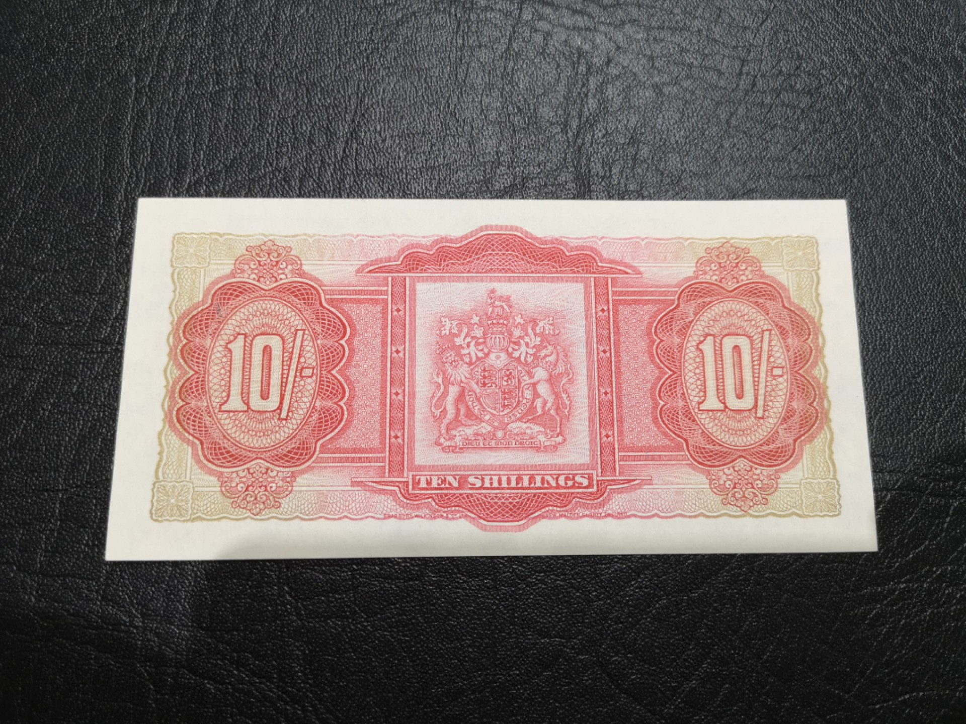 《外钞收藏家》第一百八十七期（本期71件） 1957年百慕大10先令 AU品相 有不明显的折