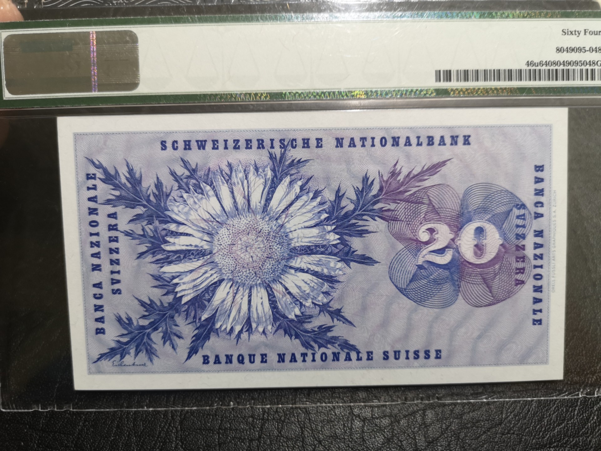 《外钞收藏家》第一百八十七期（本期71件） 1973年瑞士20法郎 PMG64 无47