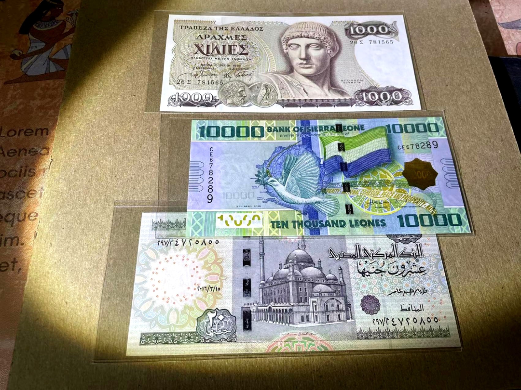 新纪元！【Blue Auction】✨世界纸币精拍第201期【精】   【一组4张】希腊、埃及、哥伦比亚、塞拉利昂纸币一组 3张全新UNC（哥伦比亚品相如图）