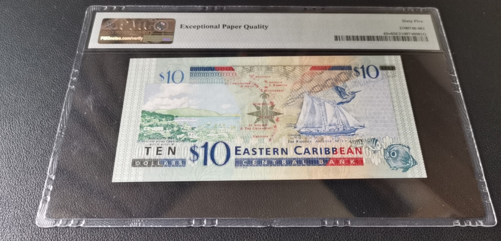 新纪元！【Blue Auction】✨世界纸币精拍第201期【精】   东加勒比 2003年10元 PMG65EPQ  p43v 女王