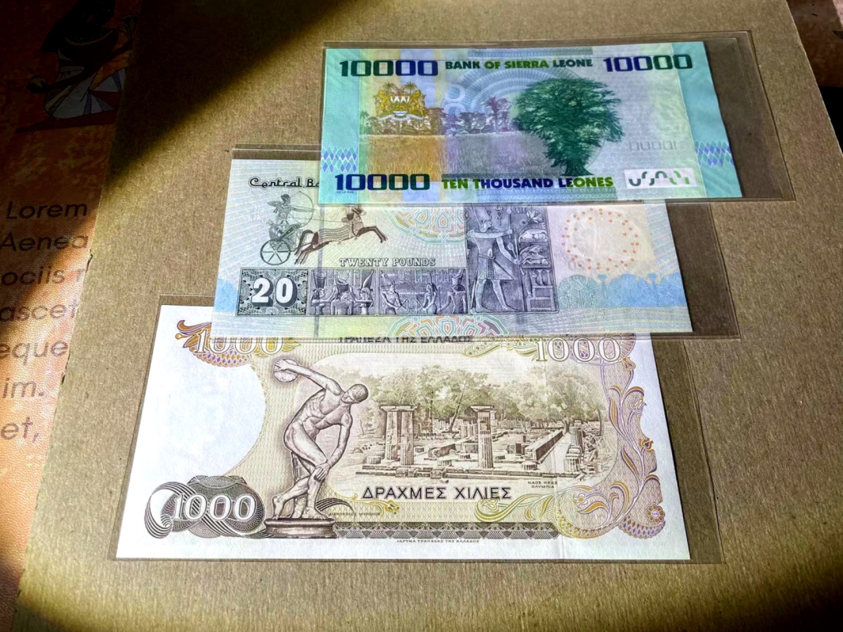 新纪元！【Blue Auction】✨世界纸币精拍第201期【精】   【一组4张】希腊、埃及、哥伦比亚、塞拉利昂纸币一组 3张全新UNC（哥伦比亚品相如图）