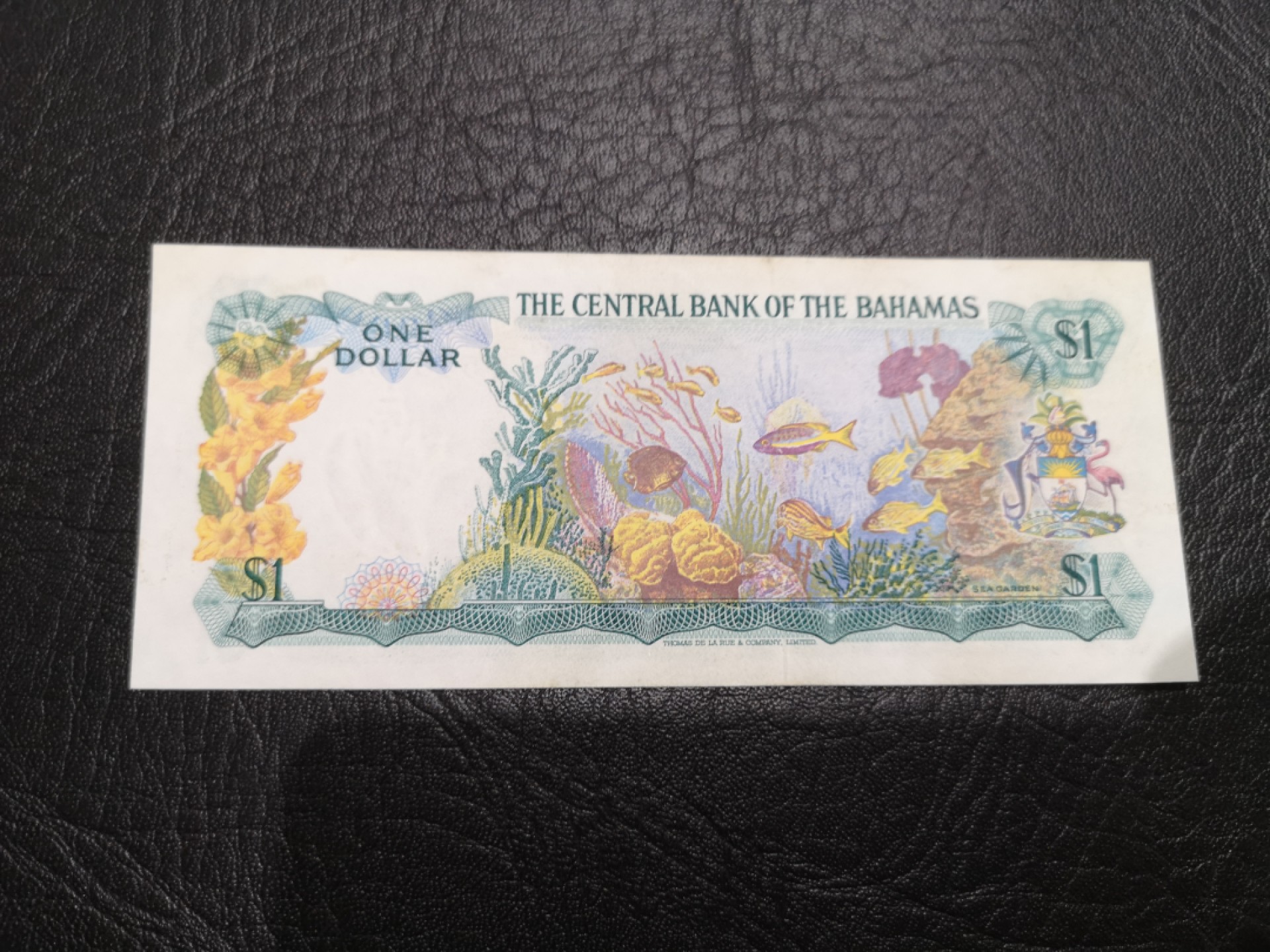 《外钞收藏家》第一百八十七期（本期71件） 1974年巴哈马1刀 全新 左上角一点油墨