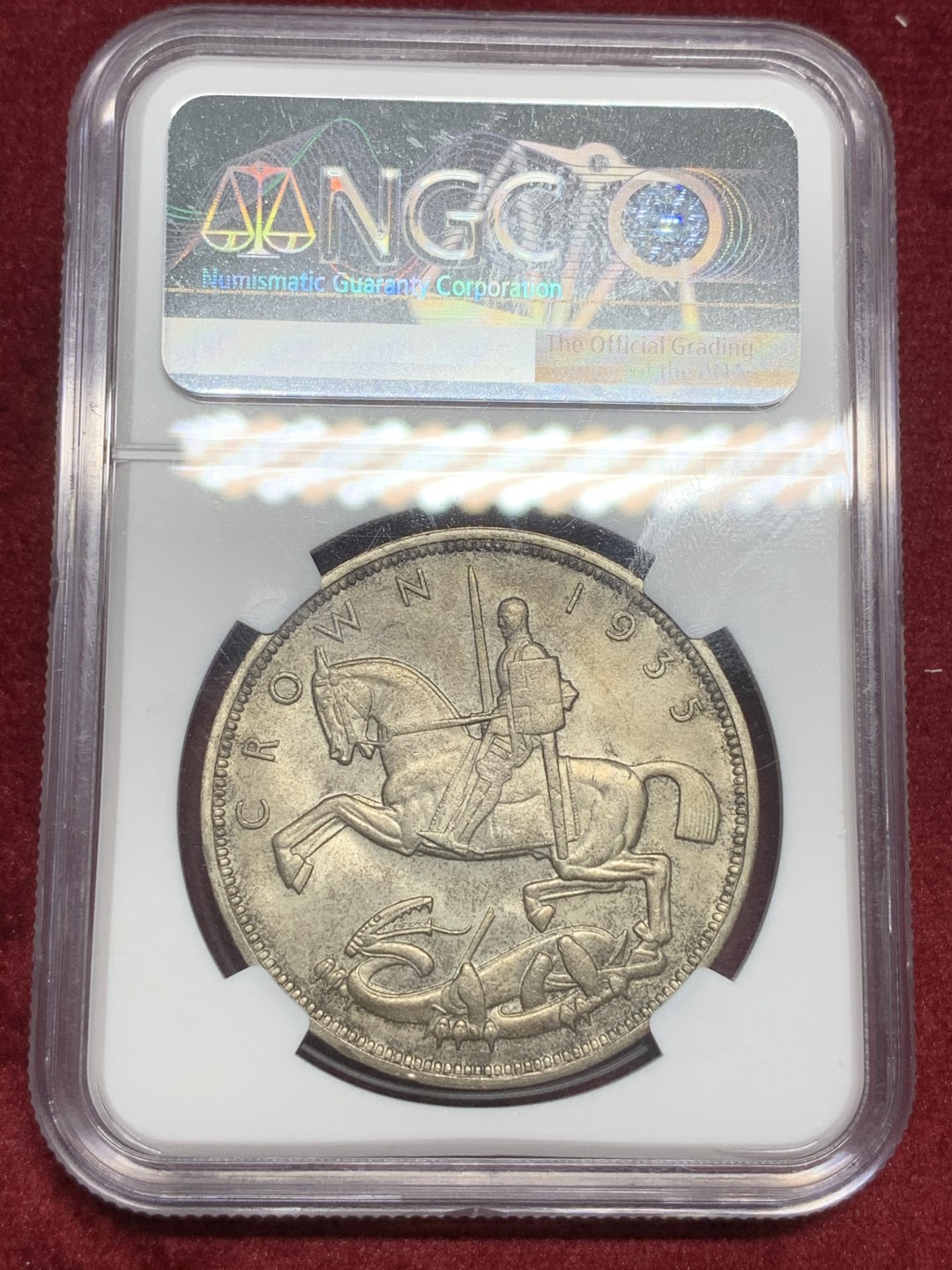 《竞宝斋》第73场-本周日，周一2场连拍（全场不限金额包邮） NGC MS63乔五1935木马剑，五彩原味包浆，重彩少见！上海严评产物，可参考竞宝斋往届白币63价格都600+！