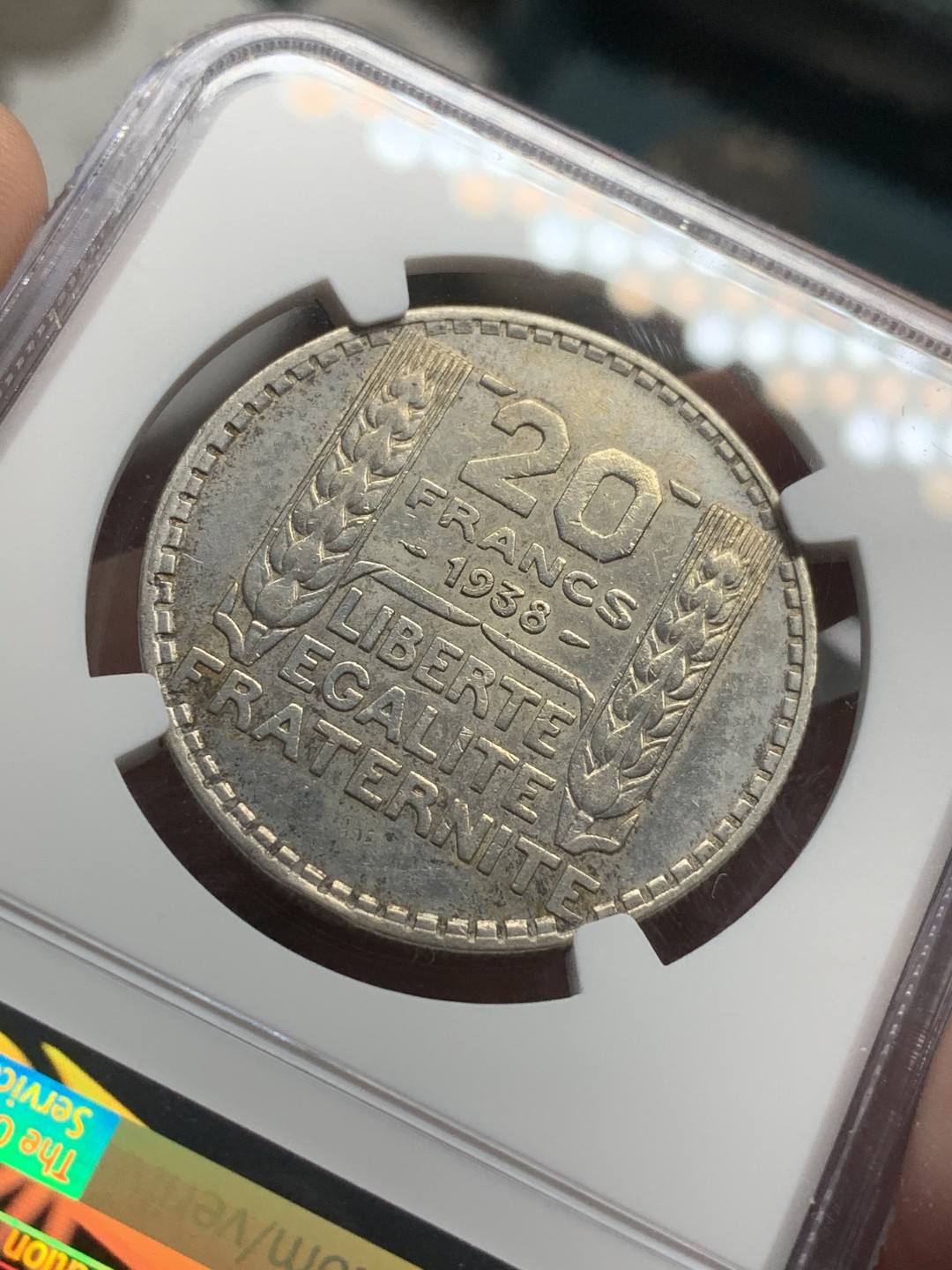 《竞宝斋》第73场-本周日，周一2场连拍（全场不限金额包邮） NGC AU评级 法国 1938年 20法郎银币