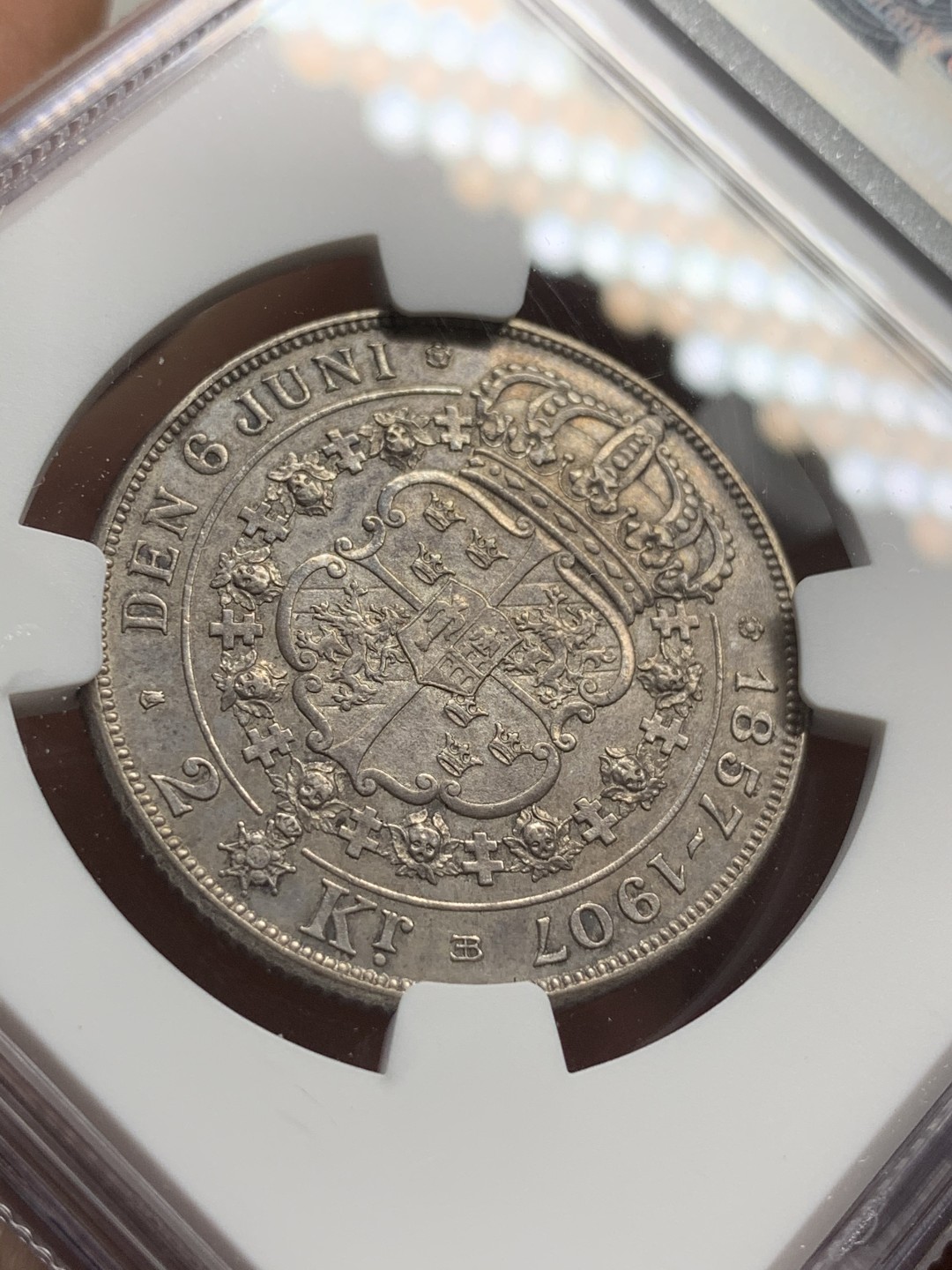 《竞宝斋》第73场-本周日，周一2场连拍（全场不限金额包邮） NGC AU细节评级 1907年瑞典国王奥斯卡二世结婚纪念日2克朗银币