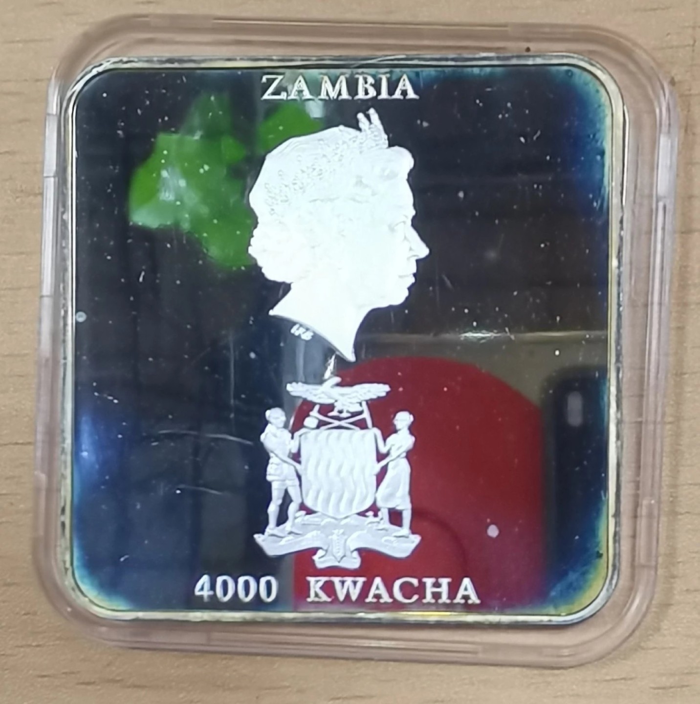 北京马甸外币专卖微拍第八十期，外国金银币专场，陆续上新，欢迎光临 赞比亚2001年抽象画橱窗里的猫方型精制纪念银币重50克成色999
