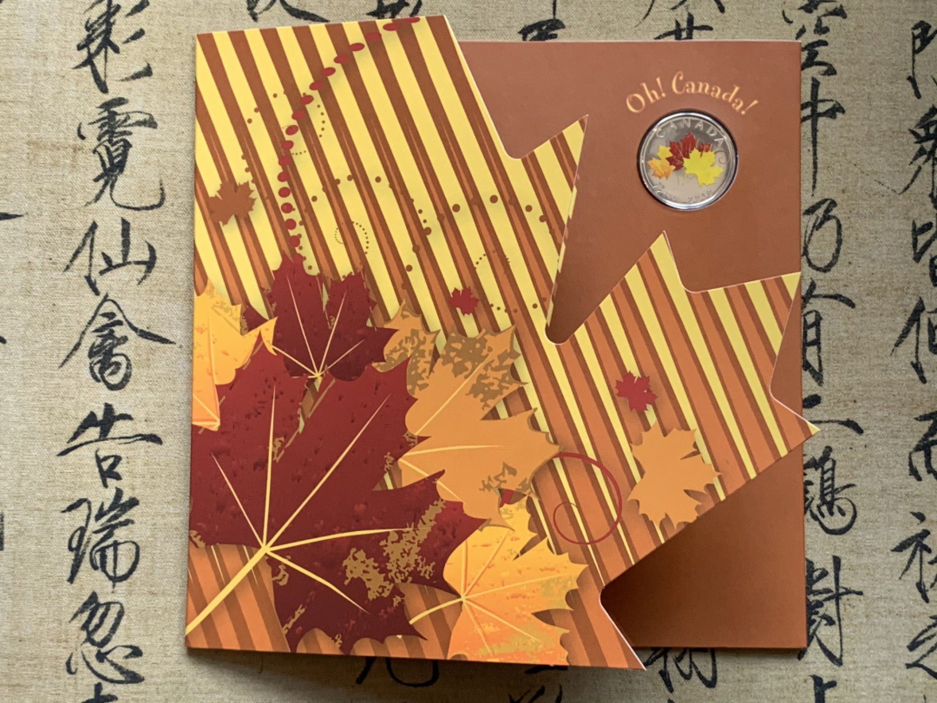 《竞宝斋》第74场-套币裸币专场 本周日，周一，周四.3场连拍（全场不限金额包邮） 3套 礼品装 加拿大 2010年 七枚装套币 其中一枚彩色枫叶 原装塑料套子 完美状态