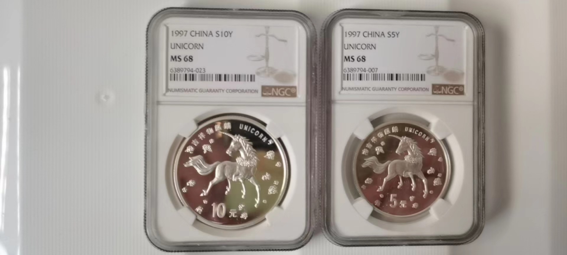 【华誉王者】2067期拍卖 1997年老银币，麒麟高分一对 NGC-MS68  老精稀的银币，数量非常少